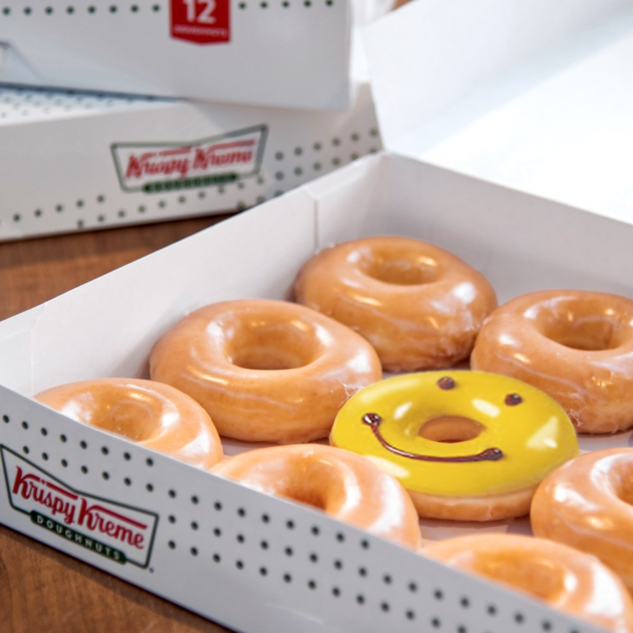 Krispy Kreme FREE Dozen Original Glazed Doughnuts w/ Purchase